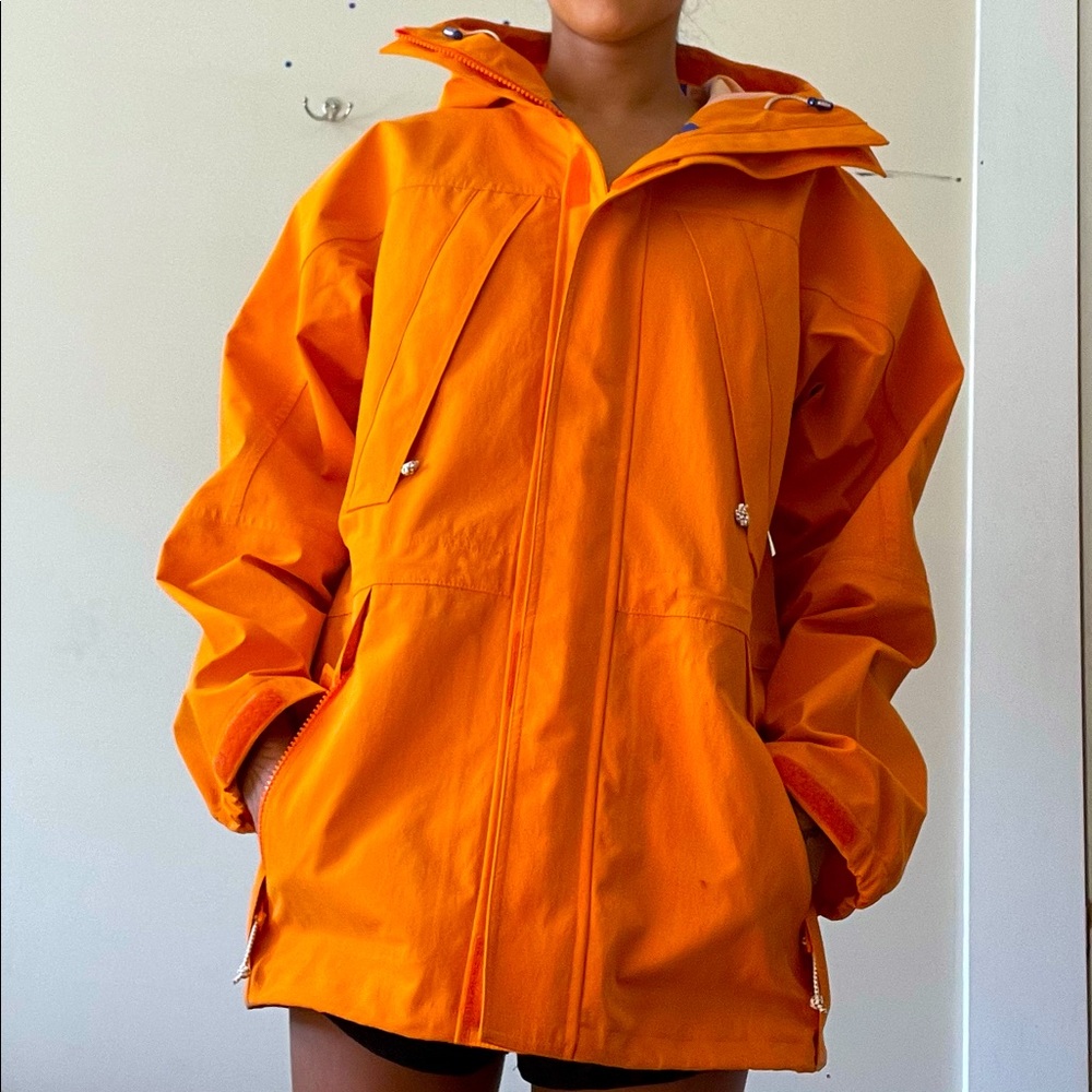 Tory Sport Orange Raincoat